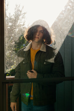 Portrait Through Storm Door with Sunlight