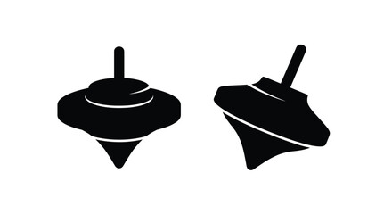 Two spinning tops depicted in a striking black silhouette © MDJAMAL