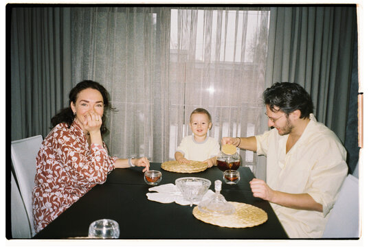 Family gathering at home  during a cozy afternoon tea time