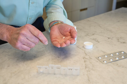 Daily medication routine for an elderly individual at home