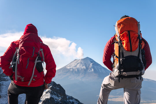 Mountaineers watching popocatepetl volcano erupting