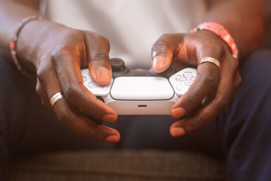 Video gamer hands and controller