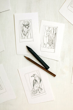 artist's table with sketches 