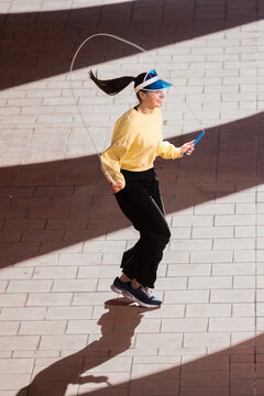Jumping Rope Vintage Vibe on Sunny Day Outdoors