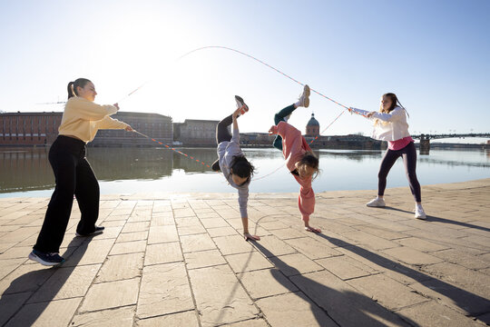 Synchronized Cartwheels Double Dutch by Toulouse Riverside