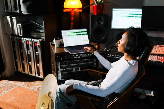 Woman Music Producer Working in Recording Studio