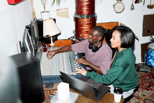 Creative Duo Working on a Sound Mix