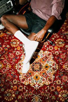 Casual Fashion Detail on Vibrant Rug