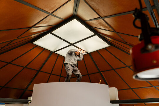 Contractor repairing skylight