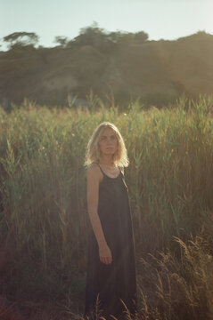 
portrait of a young woman in backlight