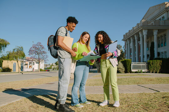 Students sharing study materials
