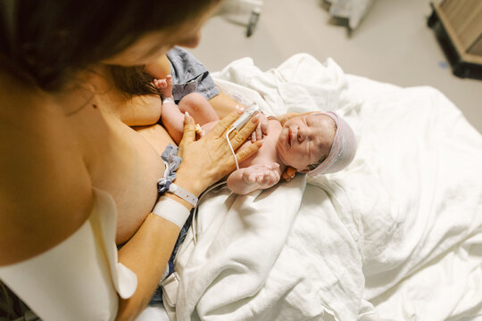 Mother Looking at Baby Right After Birth