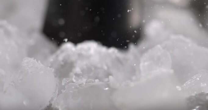 Super slow motion, Dramatic Monochrome Visual Demonstrates Ice Crystals Collapsing With Artistic Elegance