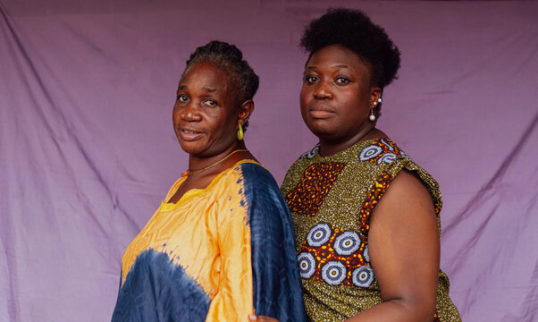 Mother and daughter posing for the camera