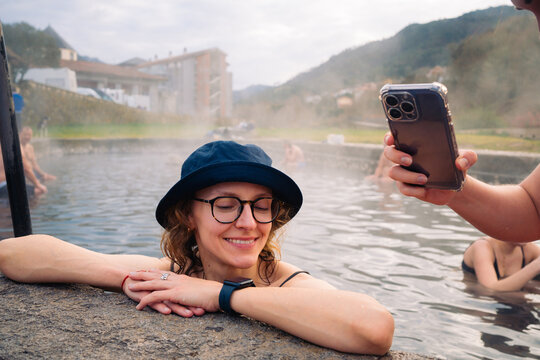 Woman enjoying a hot spring bath