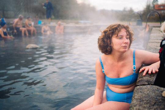 Thoughtful woman in a hot spring