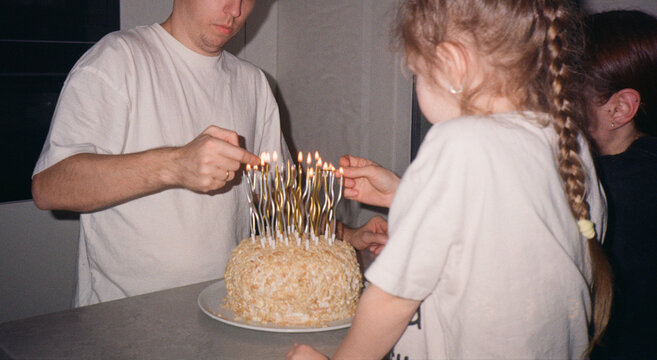 Family Lighting the Birthday Candles  - film analog