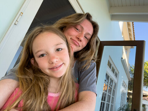 Teenager smile Sister portrait looking at camera selfie UGC