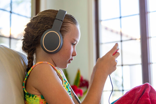 Young girl cell phone video streaming  on vacation 