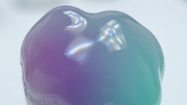 Ethereal Light Refraction Focus on the intricate interplay of light passing through a crystal, generating soft, organic caustic patterns that gently ripple and evolve on a soft, undefined background.