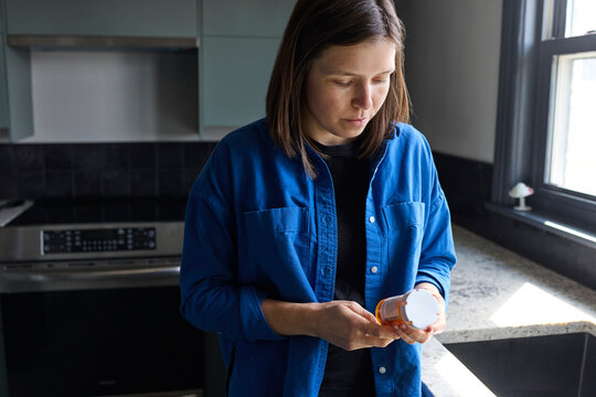 Woman taking her prescription medication