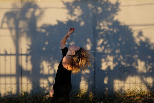 Portrait Of A Woman On A Wall Background