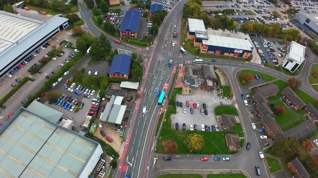 Leeds Traffic Overview. Aerial View Of Leeds Crossroads. High Angle Shot Of Leeds Busy Intersection. Aerial Perspective Capturing Busy Leeds Junction From Above With Cars And Pedestrians Moving