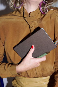 creative tools &ndash; woman holding a notebook