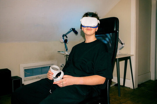 teen playing with a VR set 