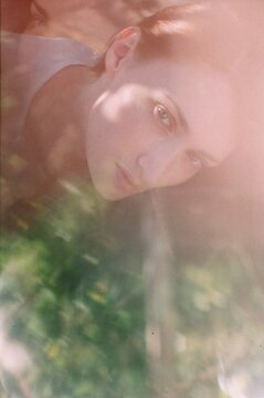 Lo-Fi Close Up Portrait Of A Woman In The Park