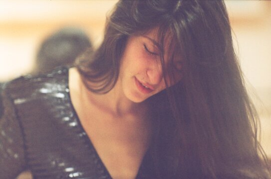 Lo-Fi Photo Of A Girl In A Dance Hall
