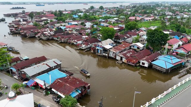 Watch as a drone captures the waterways and unique houses of Banjarmasin city in South Kalimantan