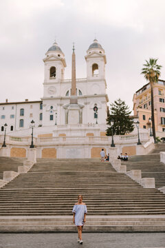Woman walking on Scalinata di Trinit&agrave; dei Monti