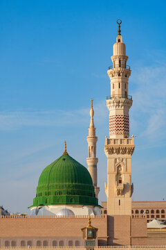 Minaret and green dome of the Prophet's Mosque (Al-Masjid an-Nabawi) in Medina, Saudi Arabia