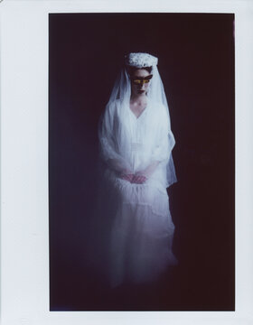 Enigmatic woman portrait with butterfly on face