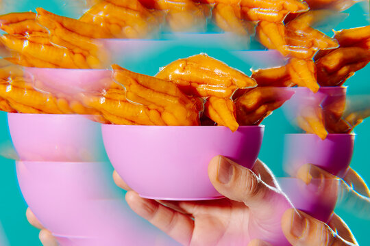 kaleidoscopic image of a bowl with some chicken feet