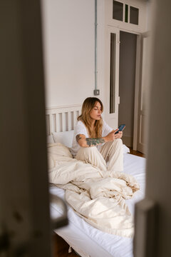 Bed Smartphone Checking