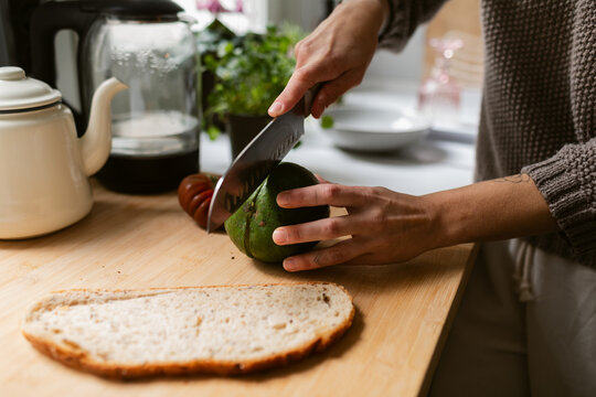 Cutting Avocado Half