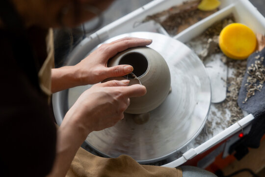 Anonymous Artist Shaping Pottery