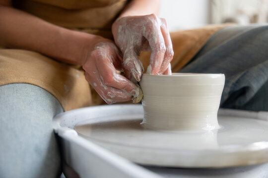 Anonymous Artist Shaping Pottery