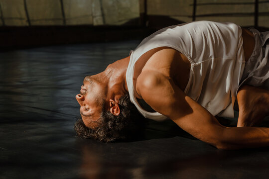 Dramatic Yoga Pose Highlighting Neck Flexibility