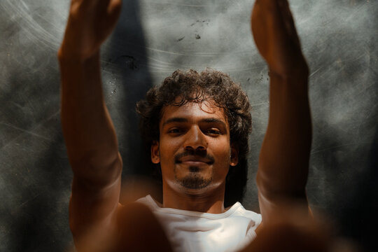 Smiling Man Doing Boat Pose Navasana Core Strength Yoga