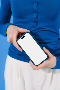 Mockup Smartphone with White Blank Screen in Hand on blue background