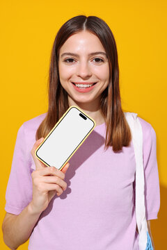 Portrait woman Mockup phone with white screen on yellow background