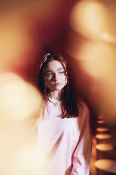 Fashion portrait of woman in warm light