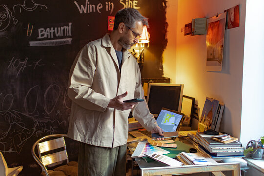 portrait of a designer working in his office