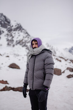 Young man in the middle of the snow