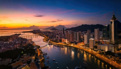 Fototapeta premium Stunning cityscape of Xiamen, China at sunset with vibrant sky.