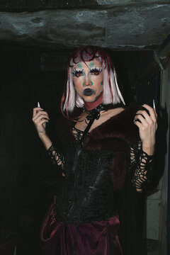 Portrait of a drag queen at night outdoors