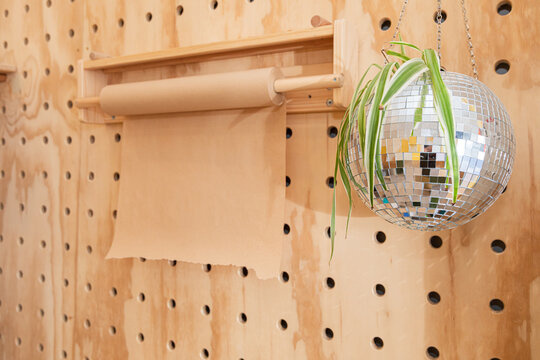 Craft paper roll and disco ball decor